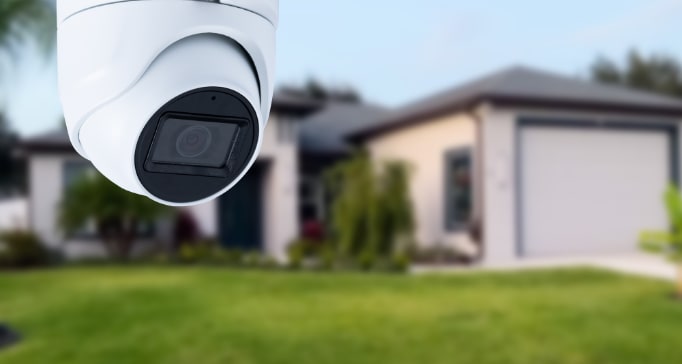 Home security camera with house in background
